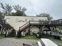 The "cabin" above the garage with all the old/broken items stashed underneath the stairs.