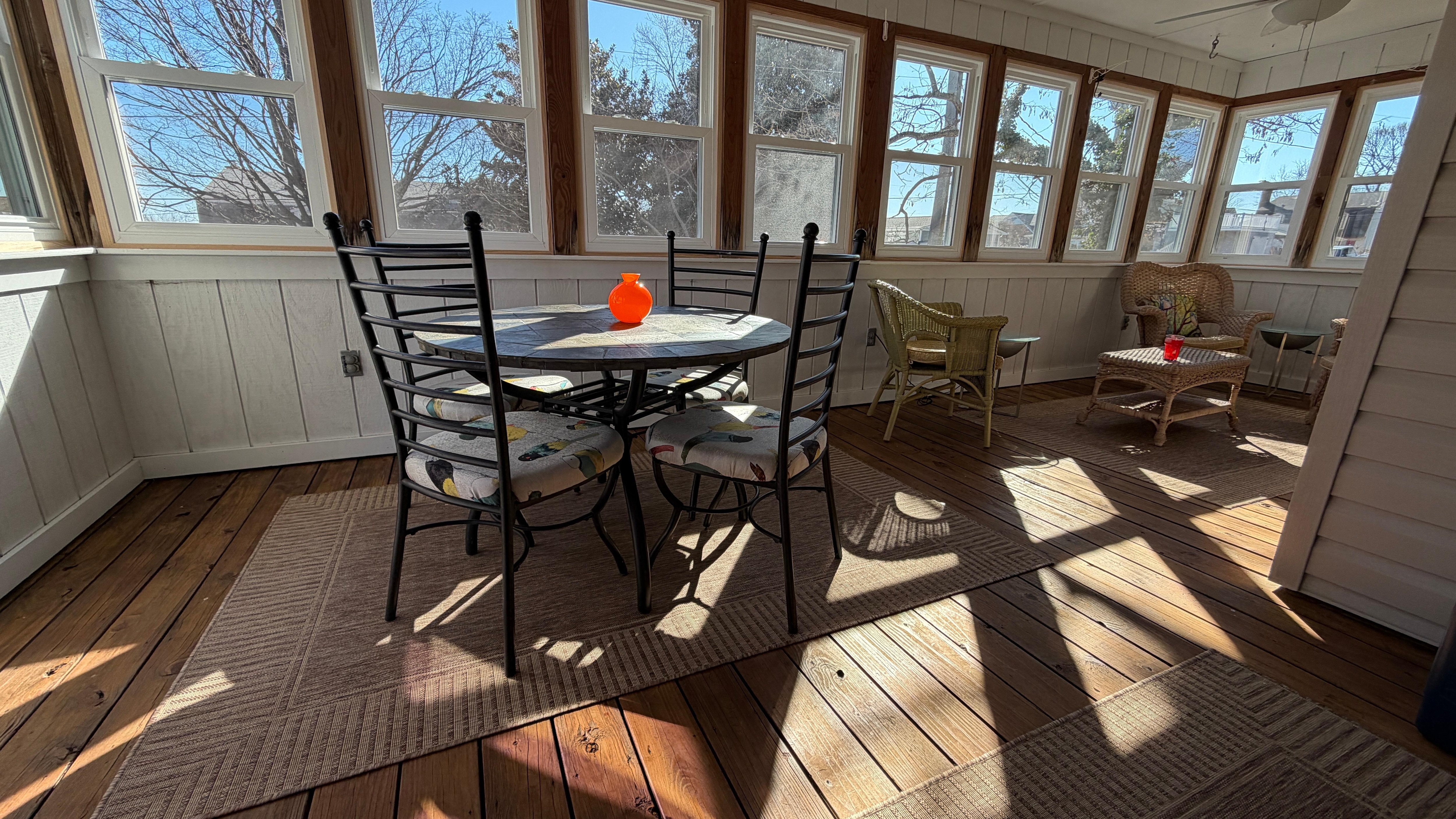 The covered porch is nice for enjoying a morning coffee. 