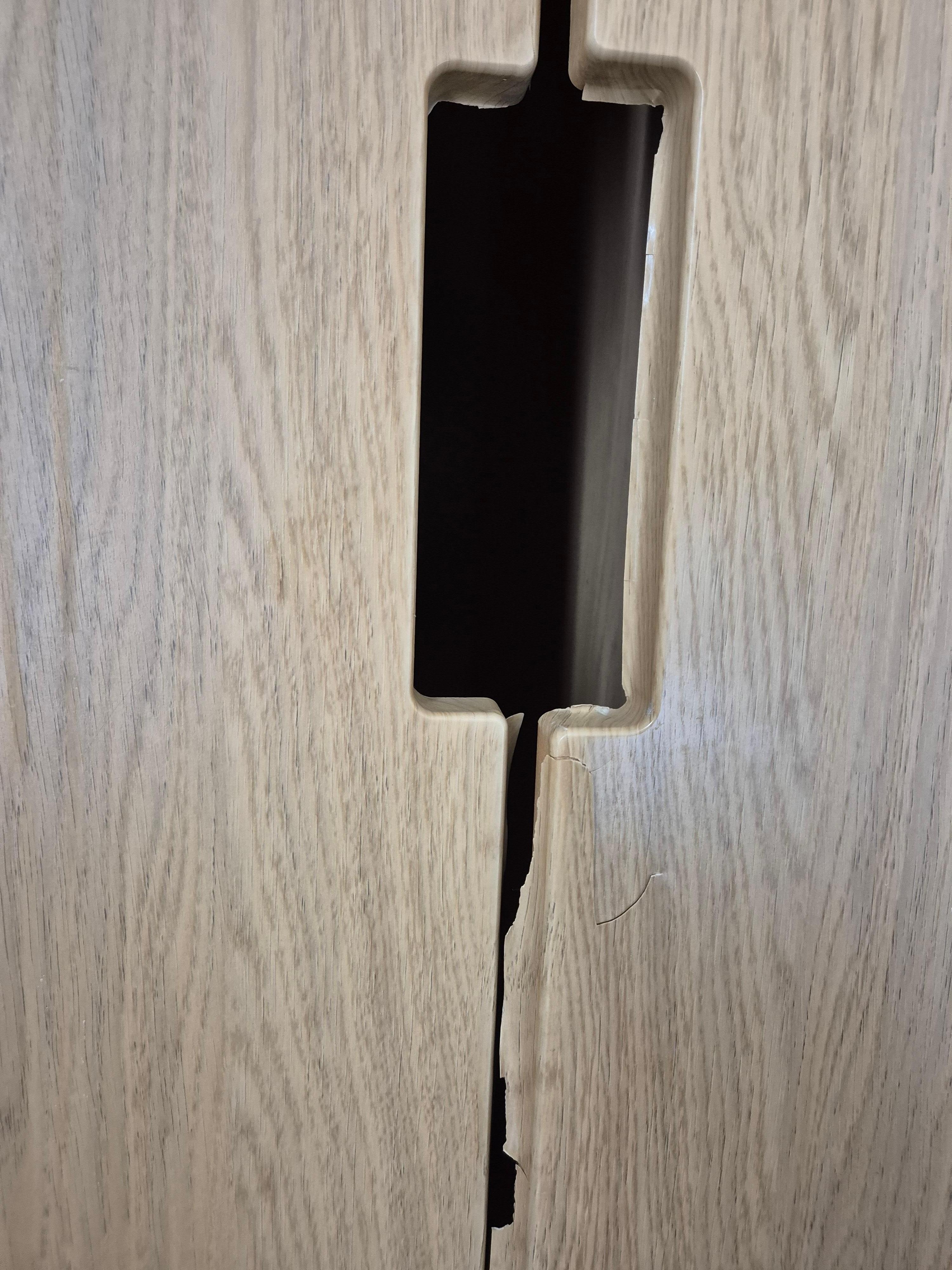 Wardrobe doors which had been wrapped and was coming off