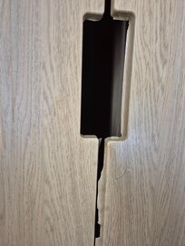 Wardrobe doors which had been wrapped and was coming off