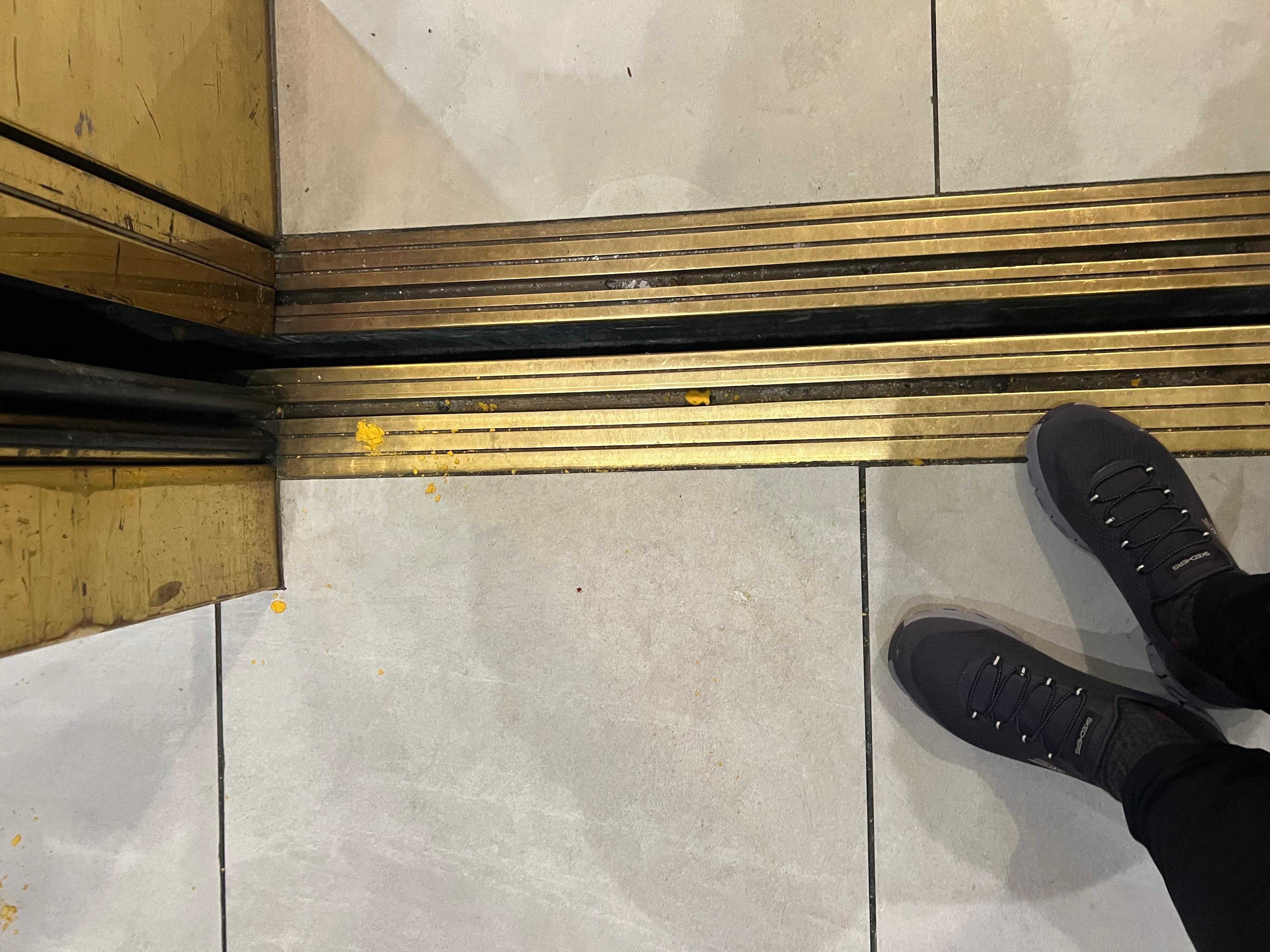 Cheese nips purposely spread around the elevator.