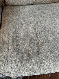 large stain on couch