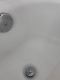 Hair and film in tub