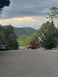 To the left of the cabin