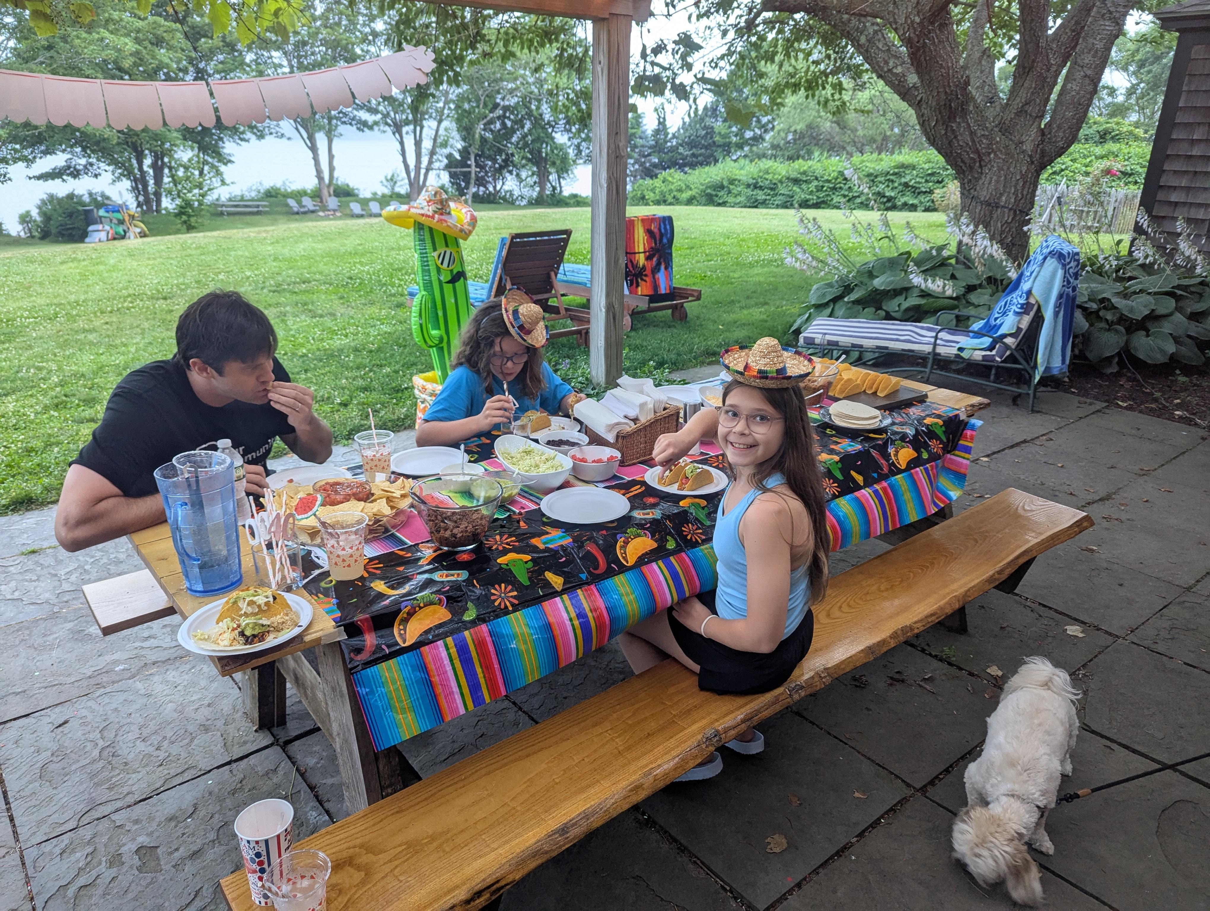 Back yard patio with large picnic table