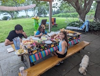Back yard patio with large picnic table