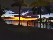 Sunset across Manatee River as seen each evening from patio.