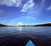 The night we arrived we were on the lake kayaking and had a perfect rainbow!