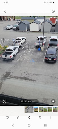 Parking lot from our room. Looks like it snowed white trucks, one being ours.