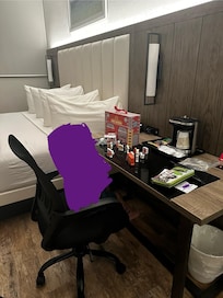 Spacious desk with coffee maker. Microwave and small refrigerator in closet too.