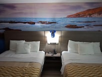 Postcards from Puu (the plushie.) He was not touching any bulbs. Just wanted to capture the beauty of the wall.