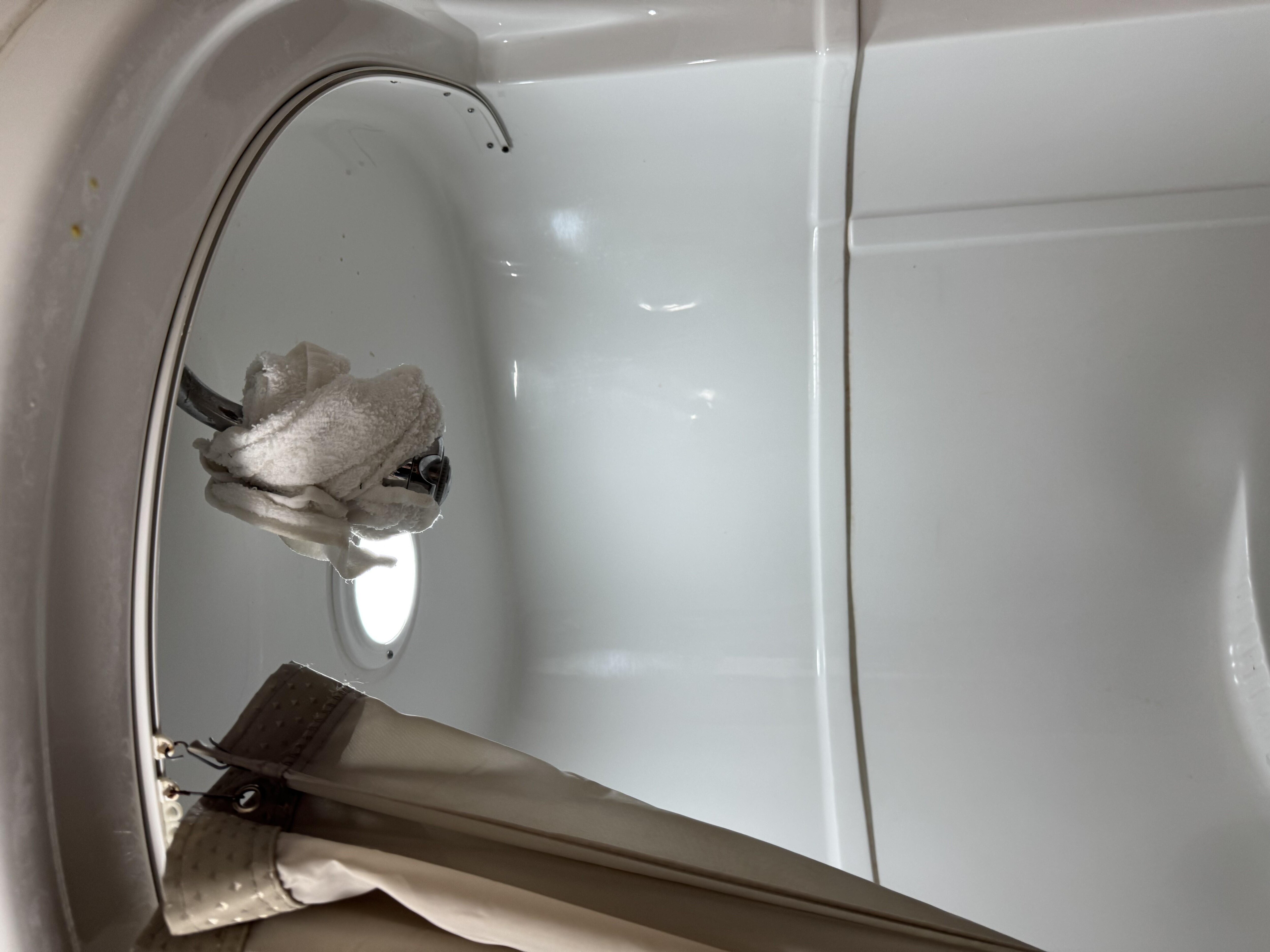 Note the was wash rag at the shower head.
