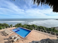 Terrace overlooking pool and ocean
