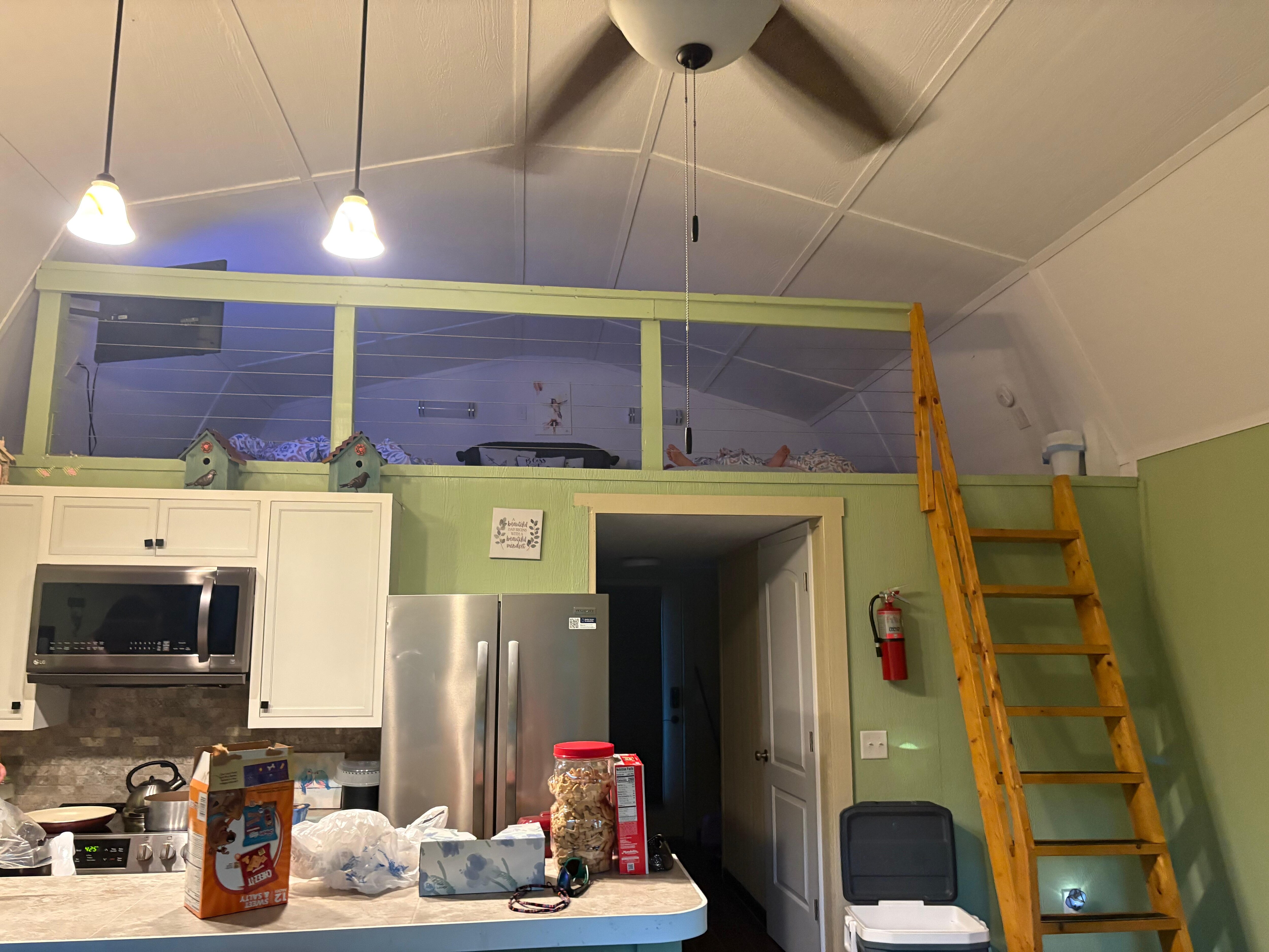 Kitchen area and loft above with 2 beds
