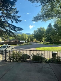 Quiet street with a distant wire of the mountains.
