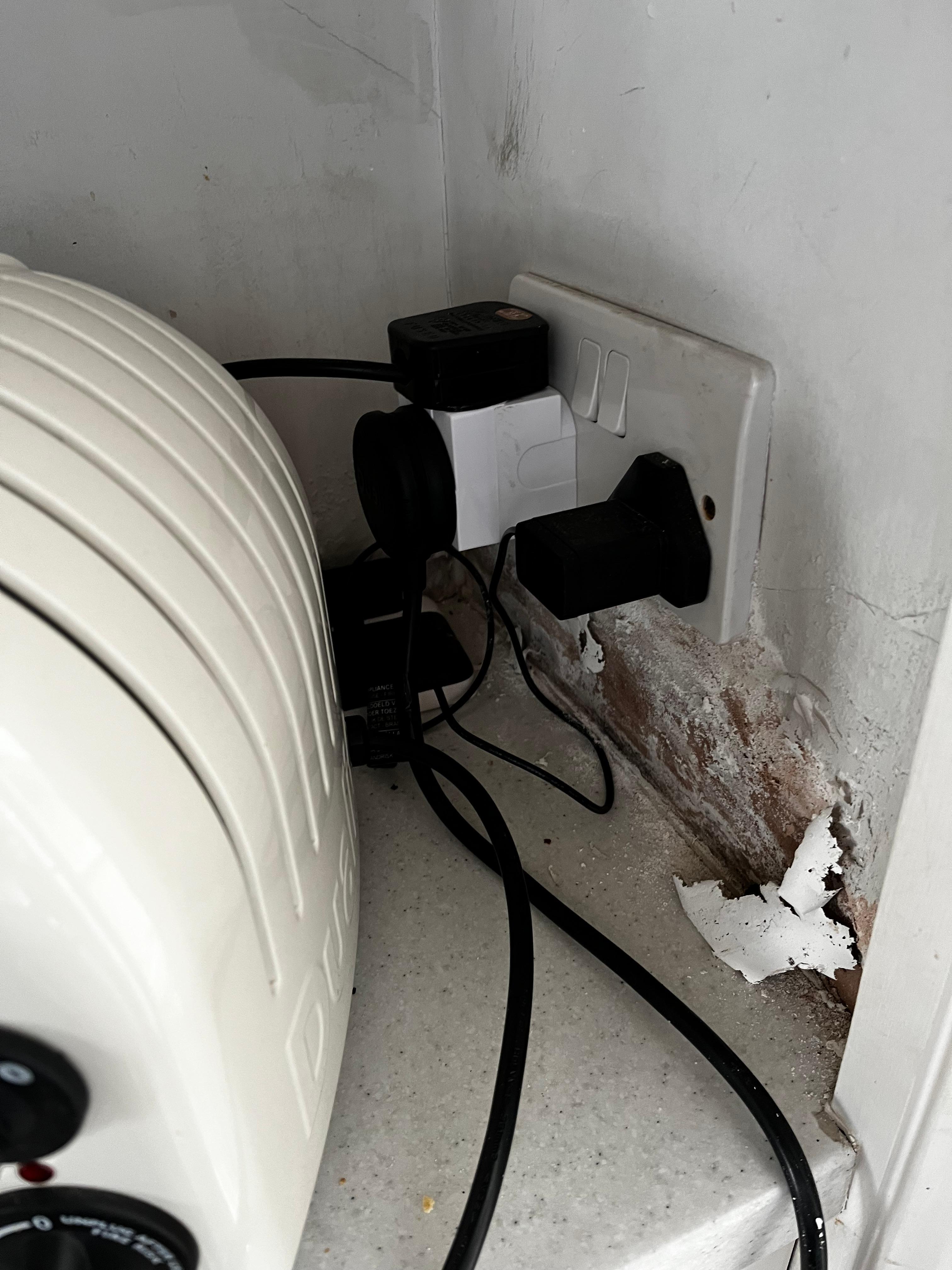 Damp wall with electrical outlet