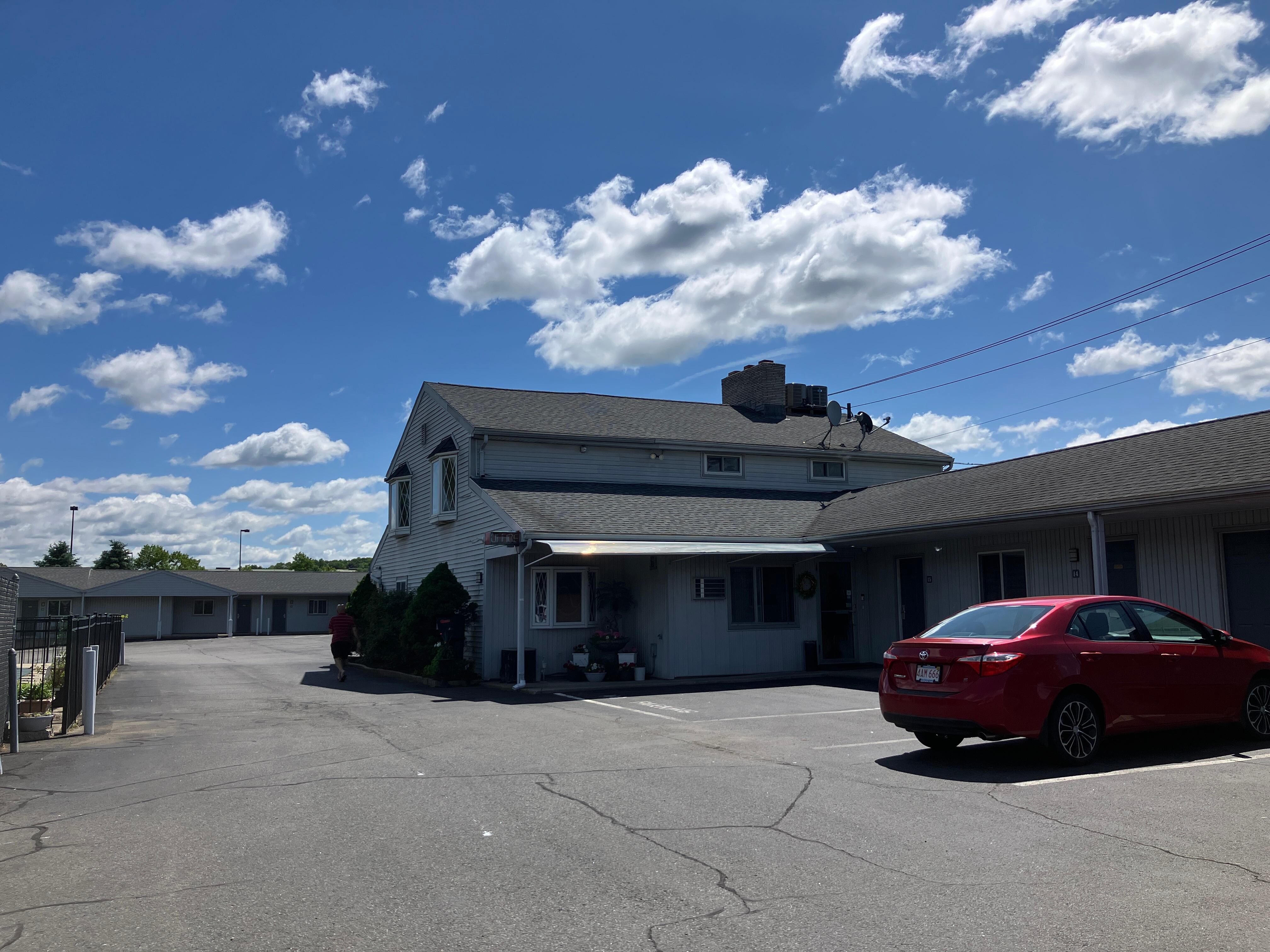 Well maintained building, pool area and landscaping.