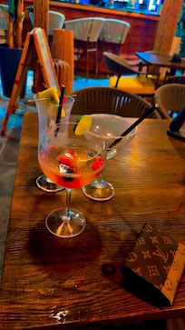 Cocktails at the bar upstairs