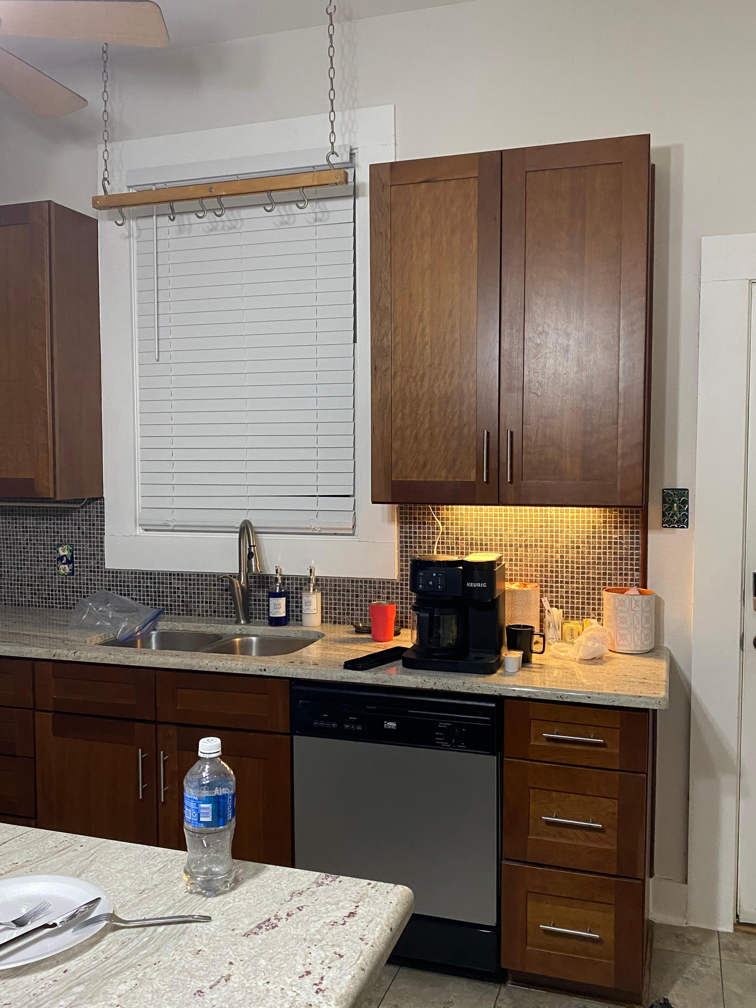 Nice coffee bar with huge canister of k-cups, creamer, sugar; along with regular coffee/filters for the brewer.