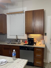 Nice coffee bar with huge canister of k-cups, creamer, sugar; along with regular coffee/filters for the brewer.