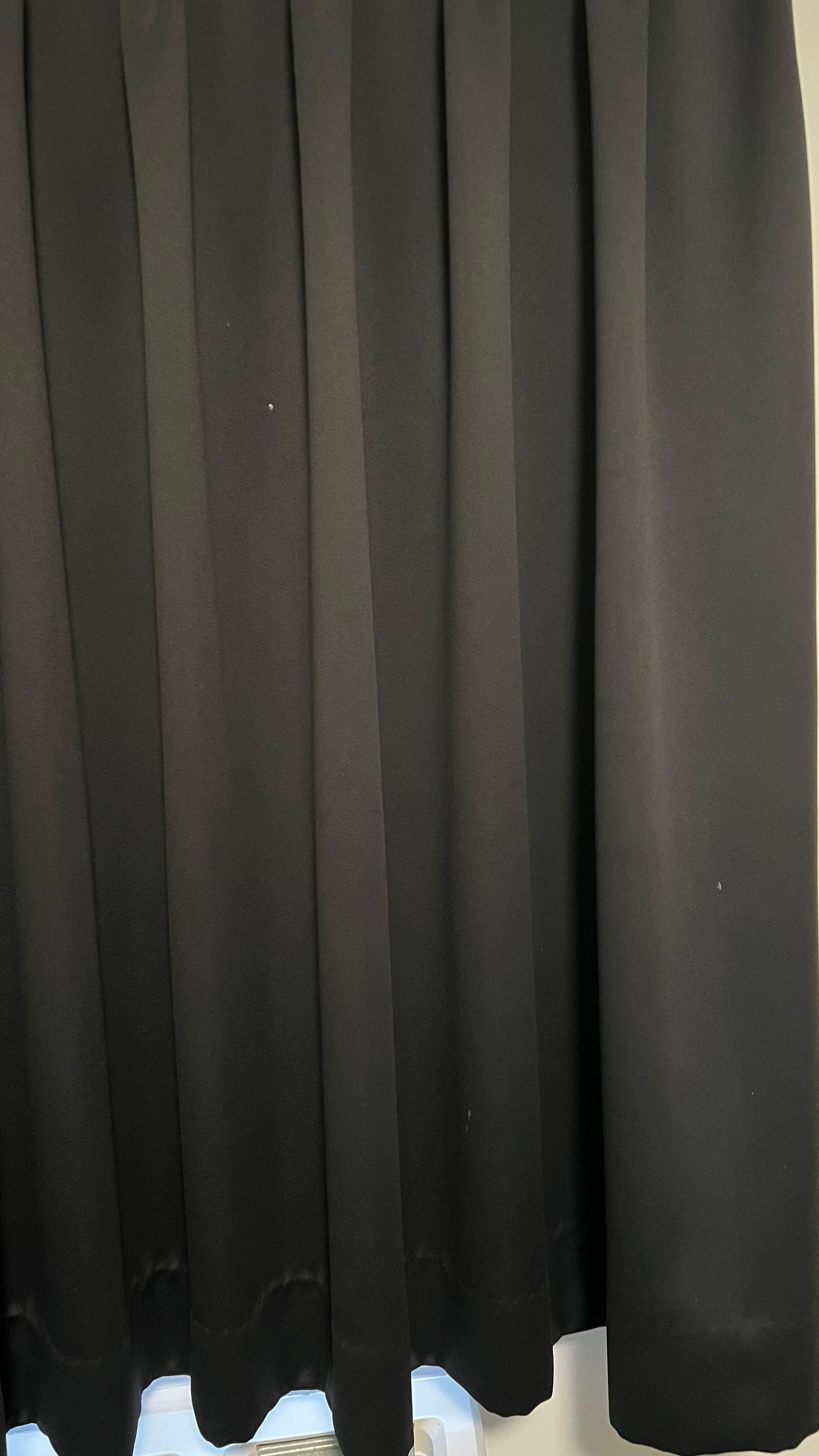 Bodily fluids on the curtain (confirmed by UV flashlight).