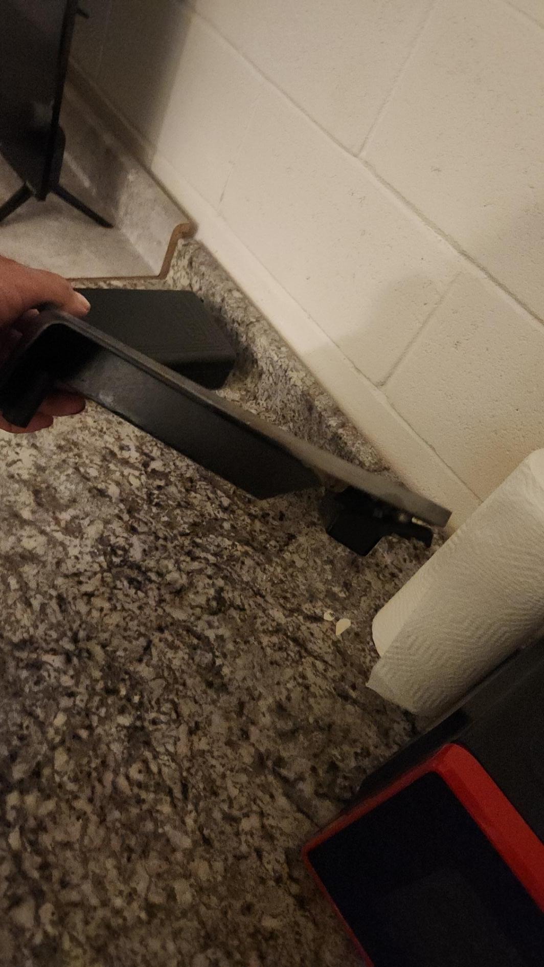 Dirty griddle with broken leg