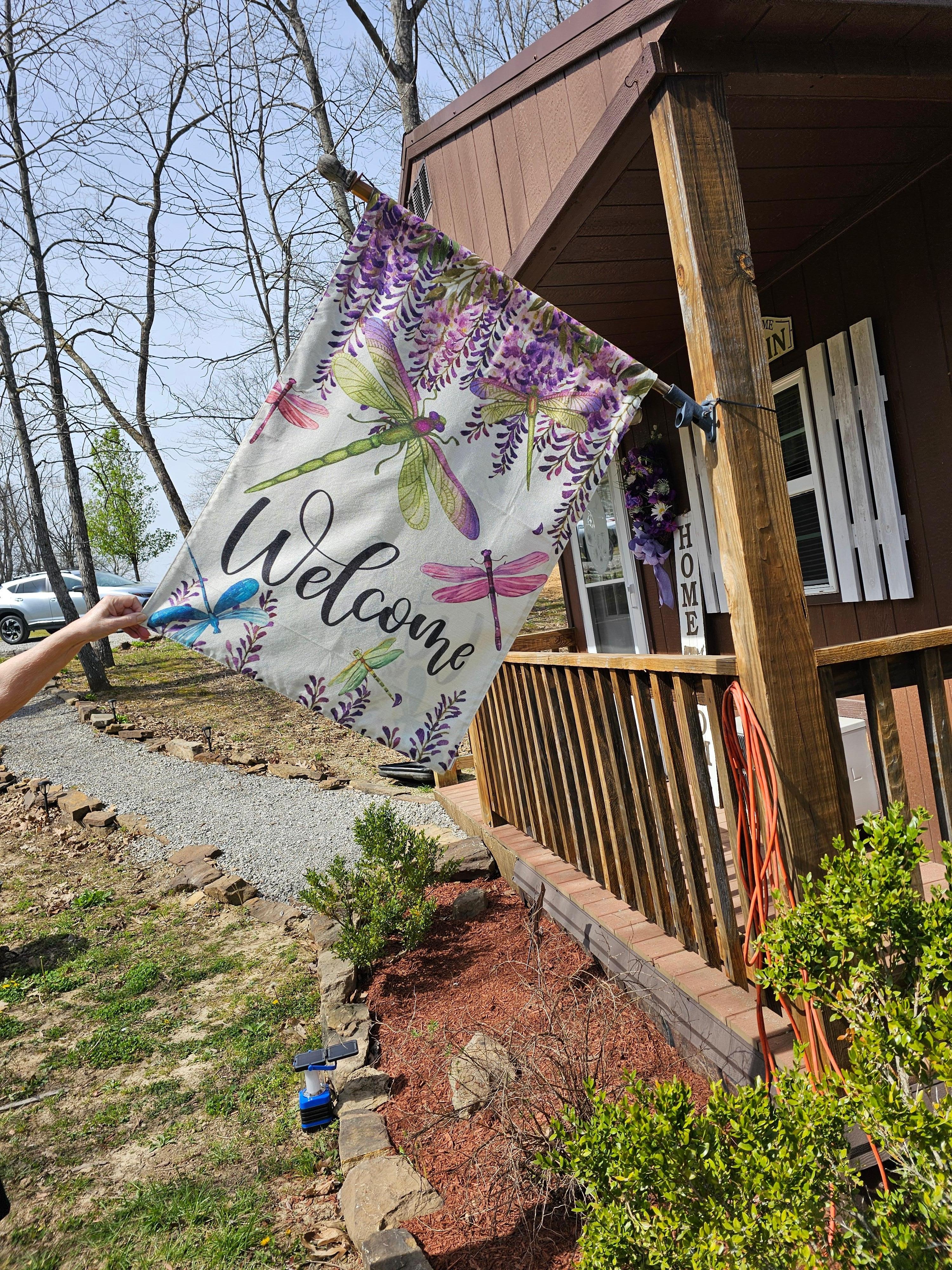 Cabin with welcome sign