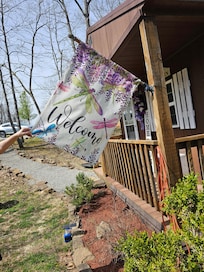 Cabin with welcome sign