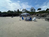 Our beach setup with cabana and chairs.