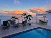 Sunset reflecting off the fluffy clouds