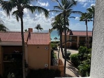 Divi Dutch Village Building 1; 3rd floor/end of walkway view looking at sea