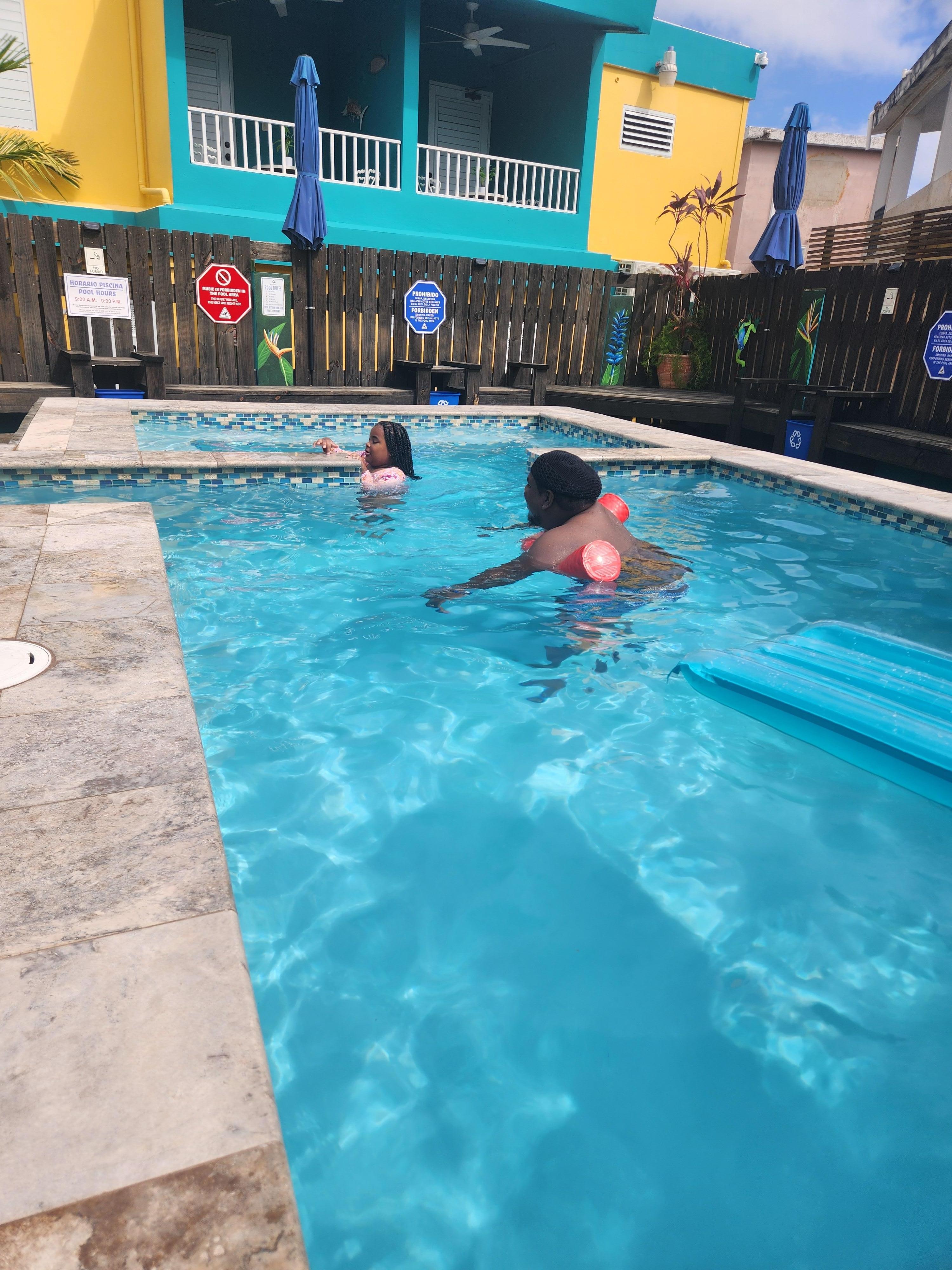 Pool area. Pool noodles and different floaties available for use there