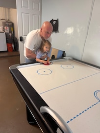 Fun at the air hockey table!
