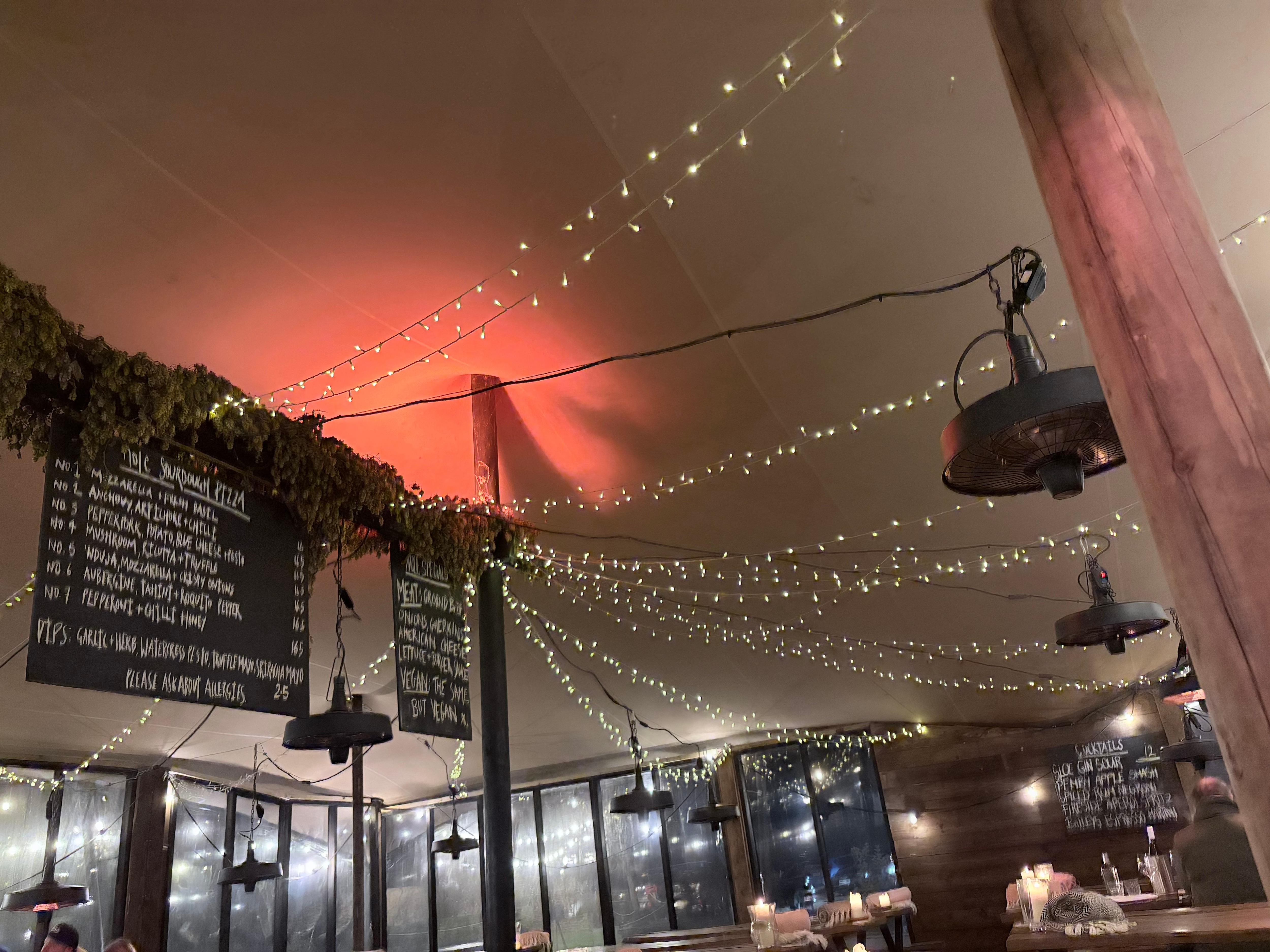 Outside lighting in the Pizza area with heaters