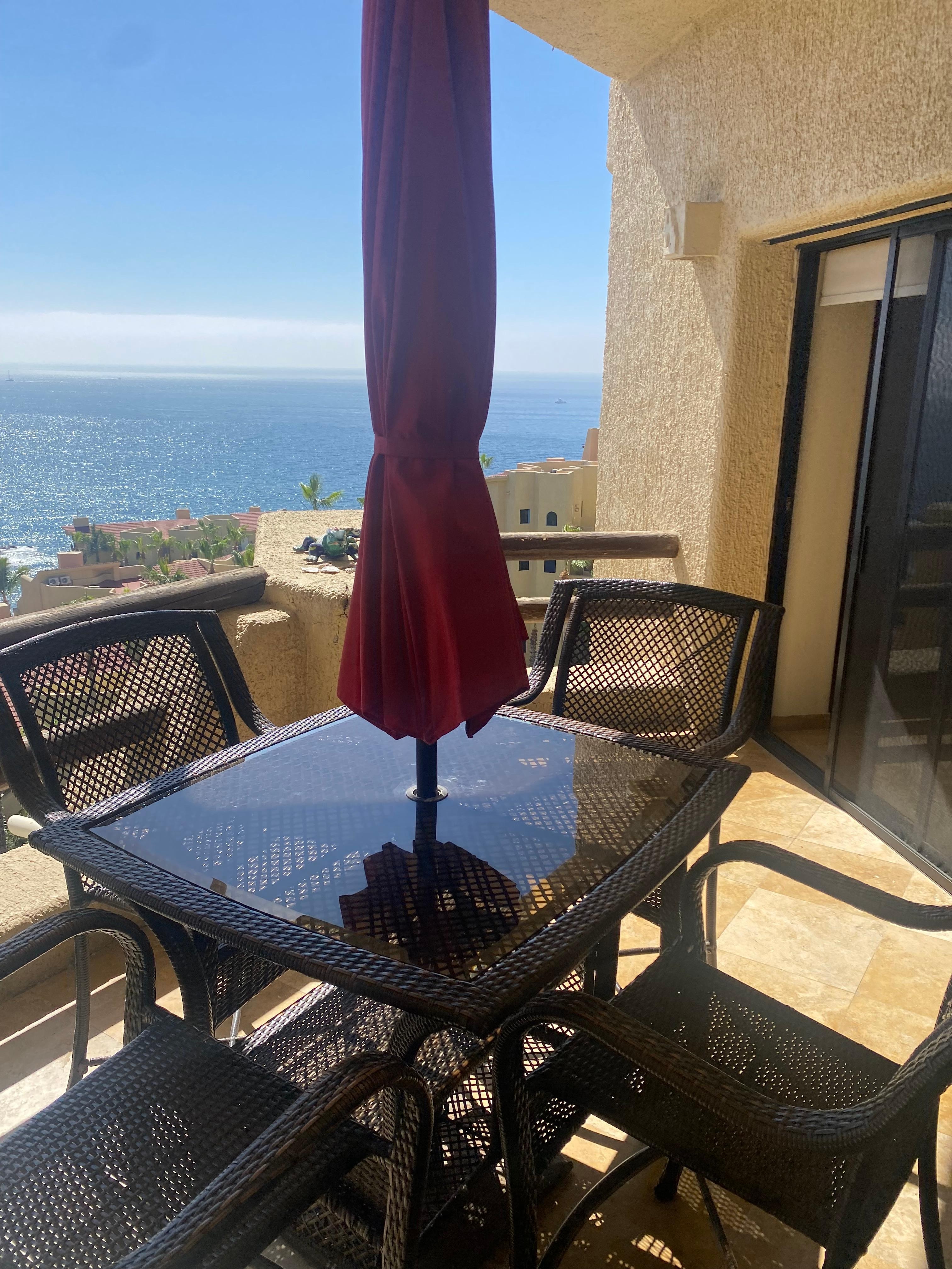 Balcony with table and chairs