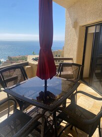 Balcony with table and chairs