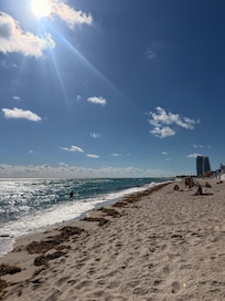 My beach view right by the chairs provided by moxy