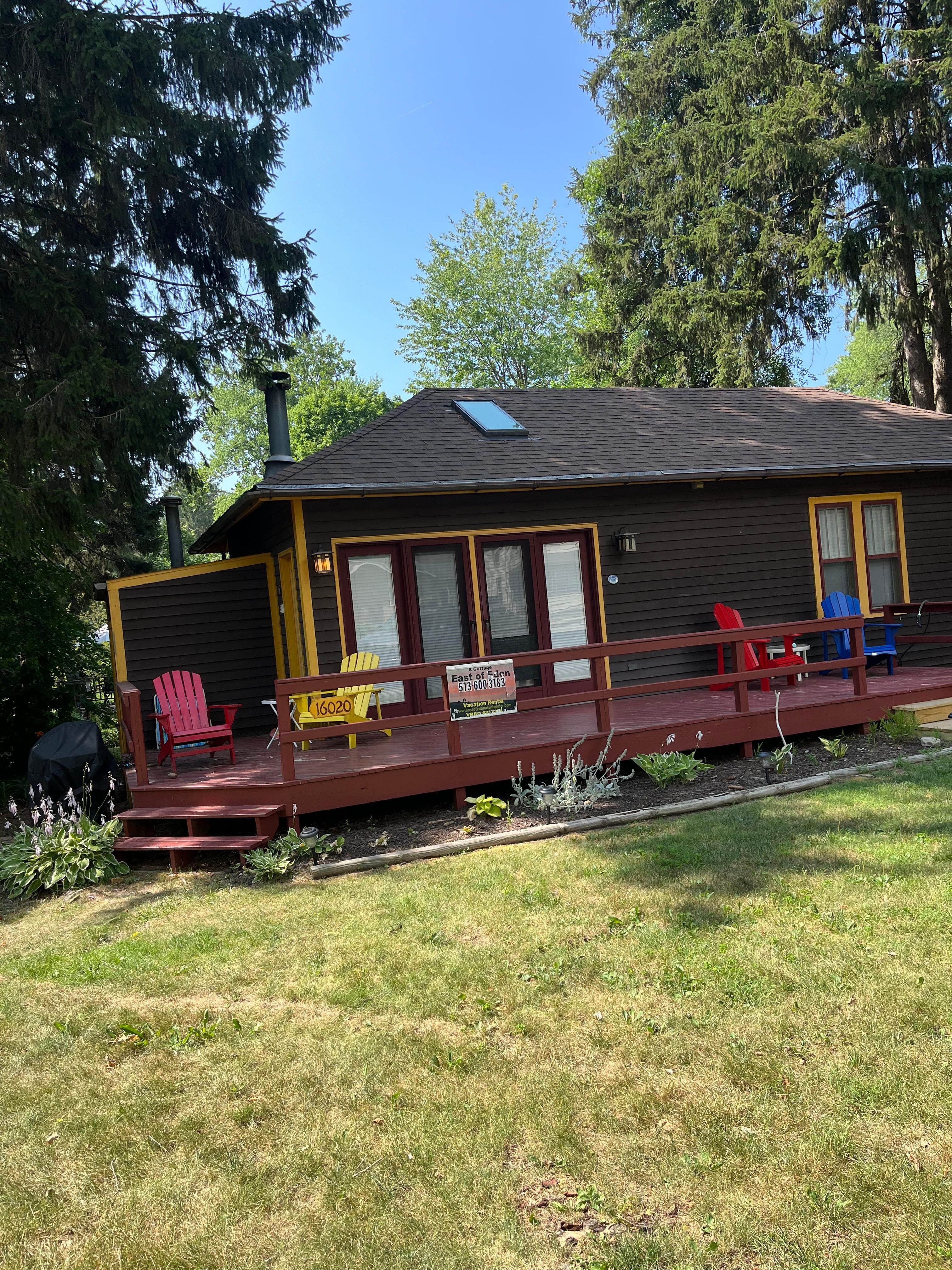 Front of house with about 4 angled parking spots right in front of it. No side or back yard. 