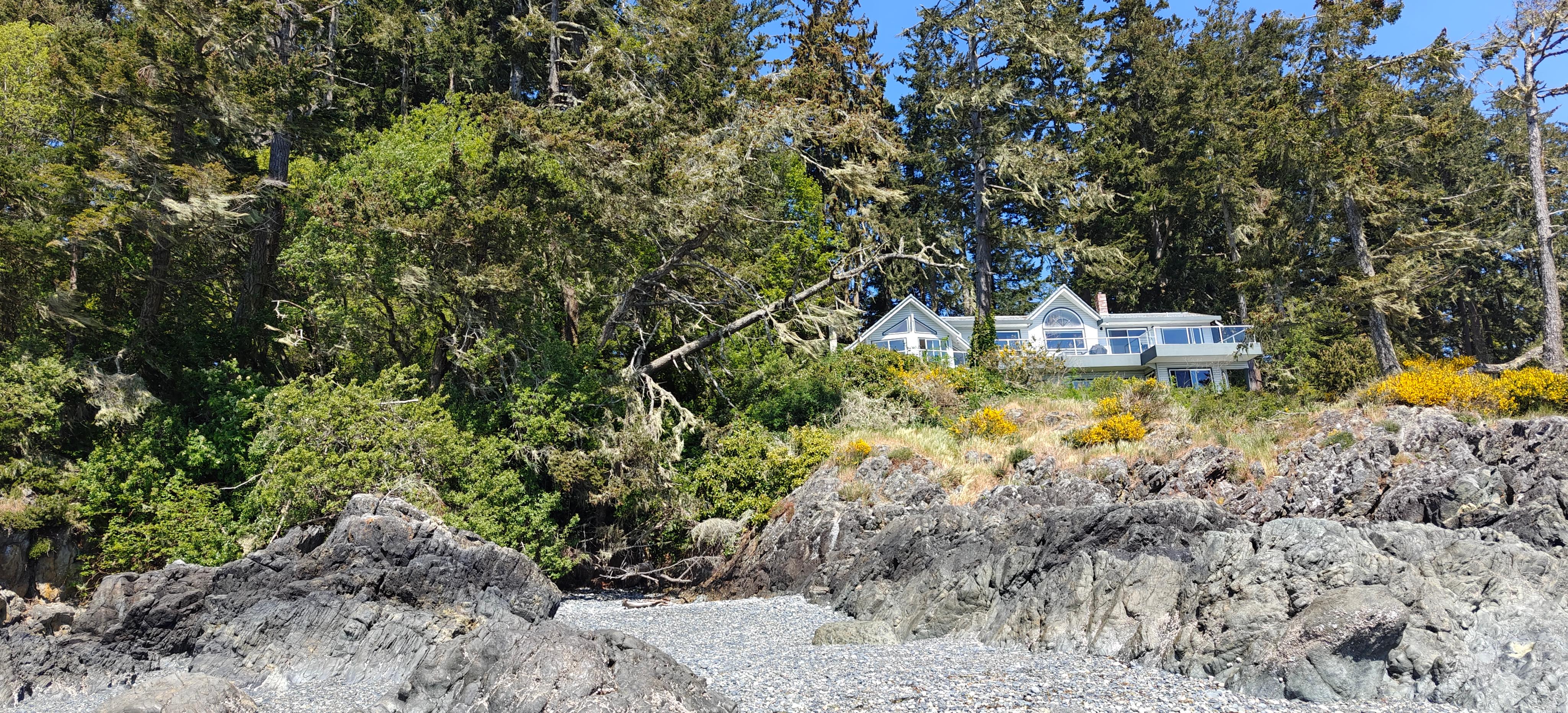 The house from the beach, this suite is the main floor, deck is part of a second suite.