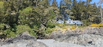 The house from the beach, this suite is the main floor, deck is part of a second suite.