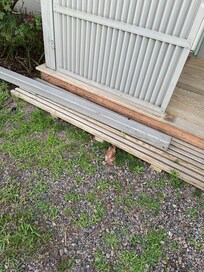 The 3x3 post on the ground after it fell.