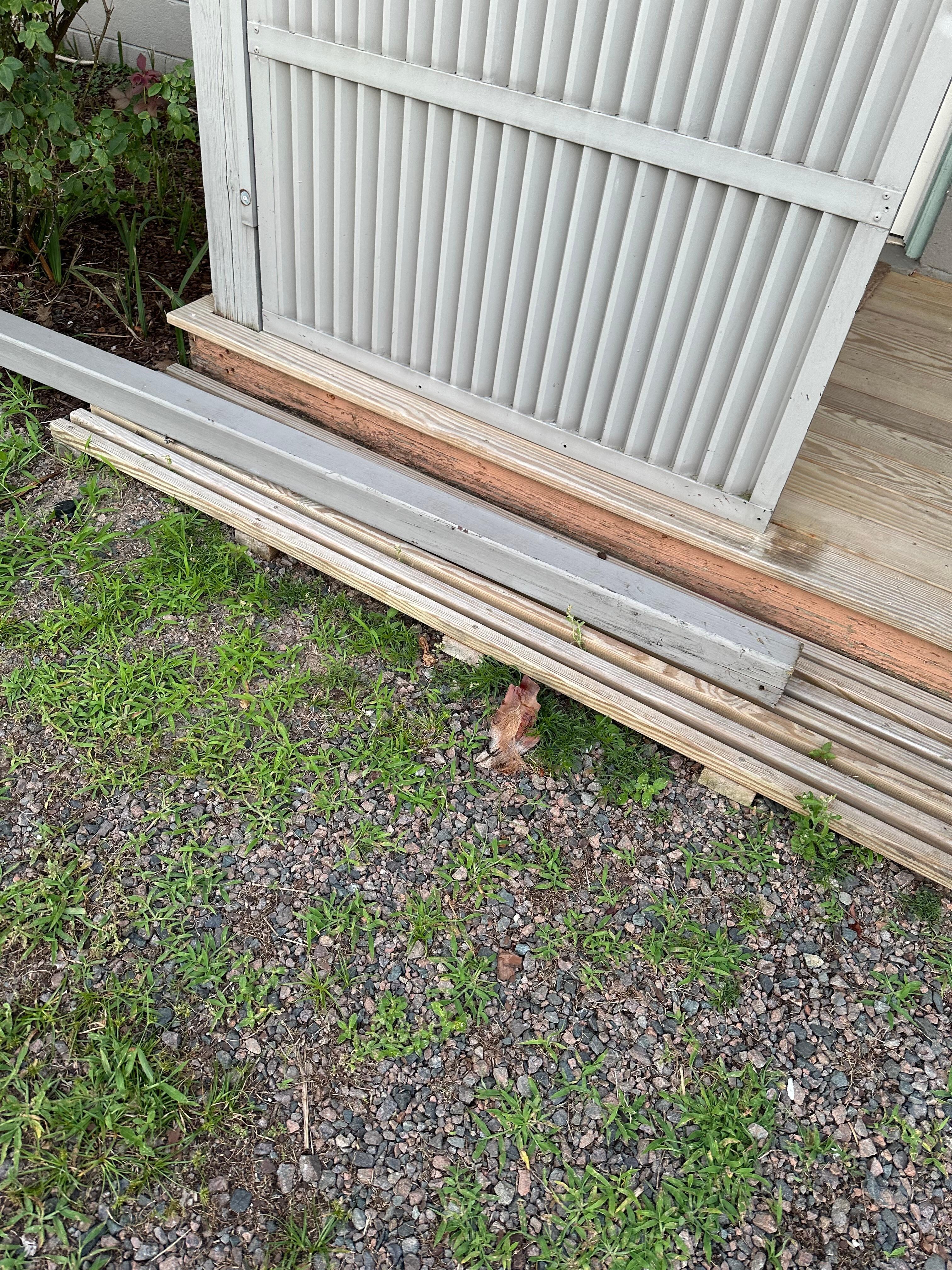 The 3x3 post on the ground after it fell.