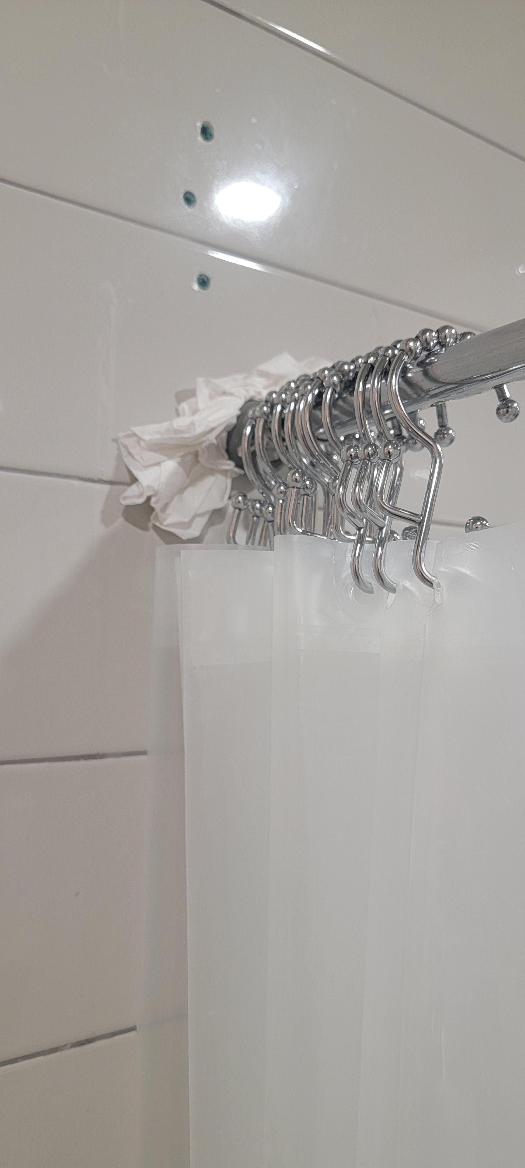 Paper towel holding shower rod