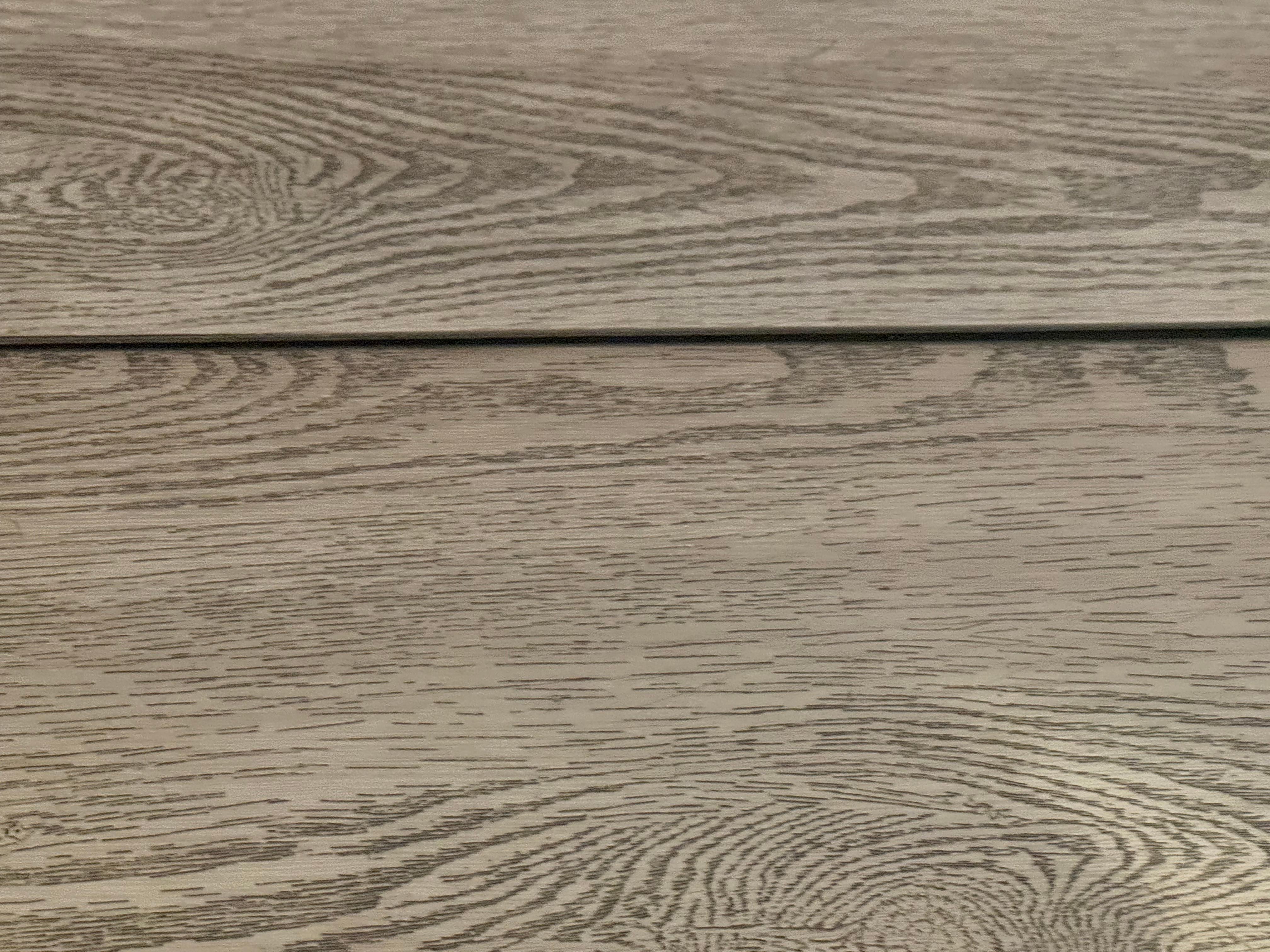 Warped floor nearly tripped on was covered with a rug 