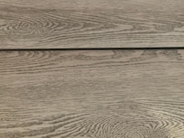 Warped floor nearly tripped on was covered with a rug