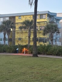 From park facing our unit's side of the building (behind the yellow)