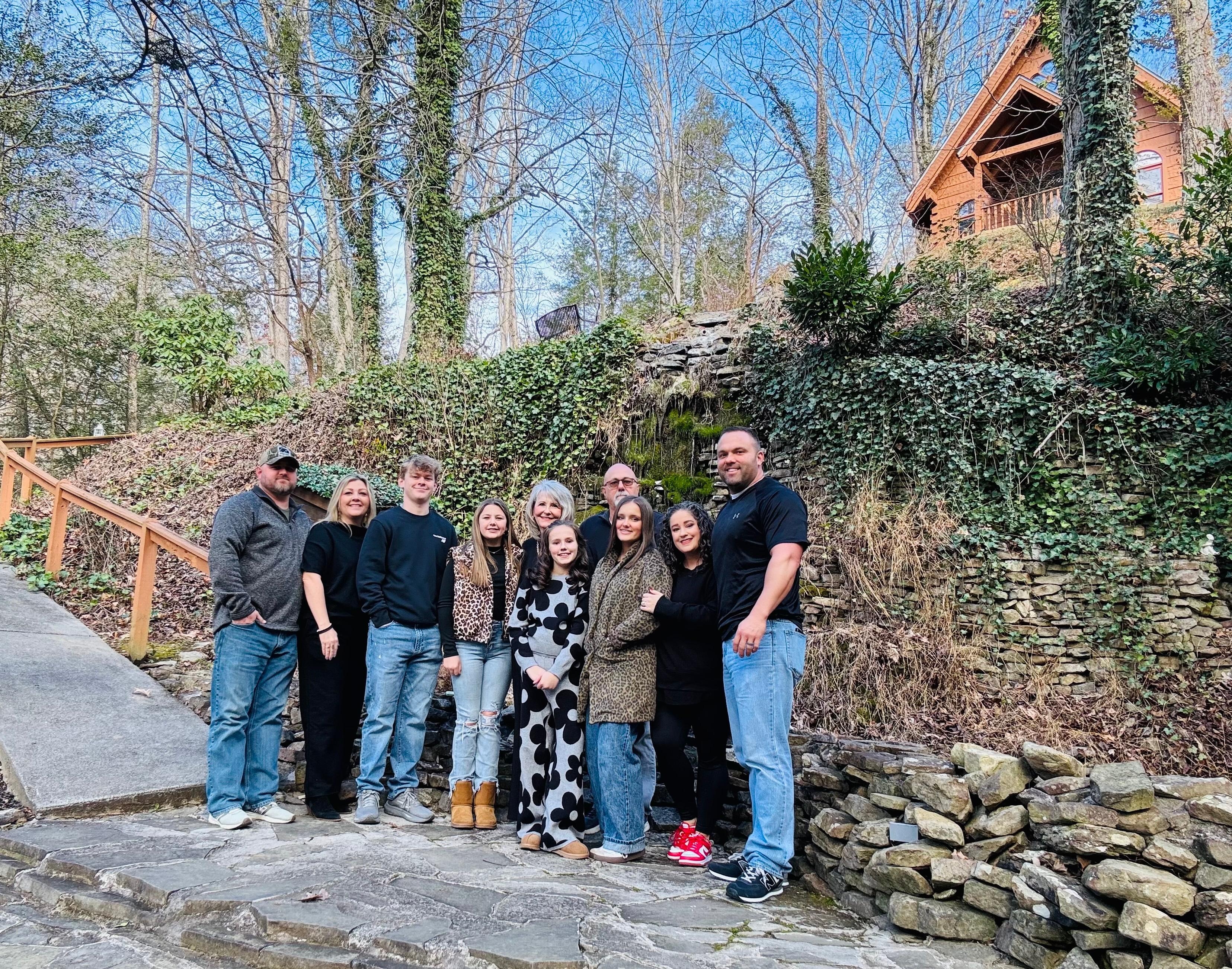 Our family at the bottom of hill from cabins at the chapel. It was a beautiful place for pictures. 