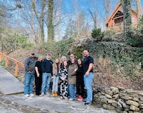 Our family at the bottom of hill from cabins at the chapel. It was a beautiful place for pictures.