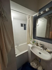 See abnormal height of tub entry - using sink as height reference.