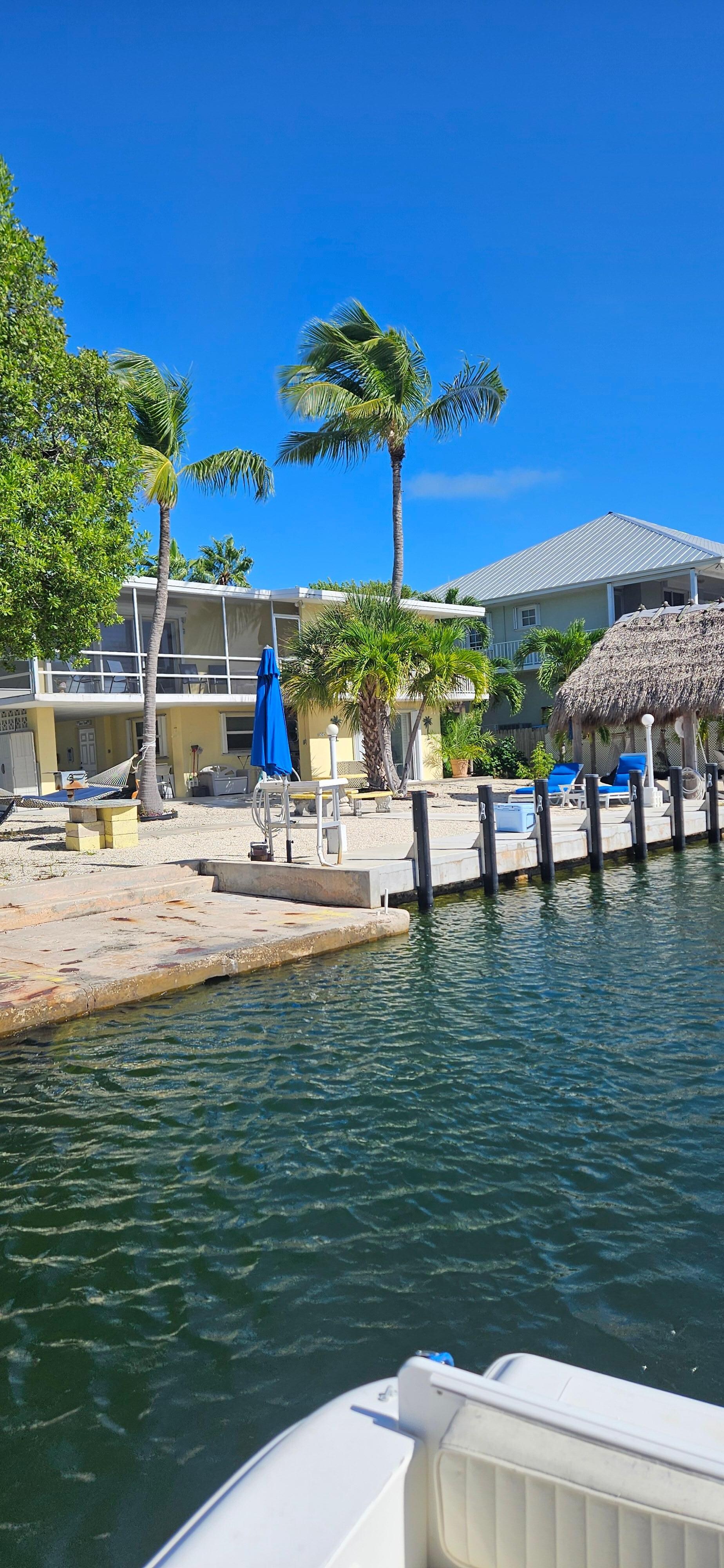 A view of the back of the home as you leave in your boat 